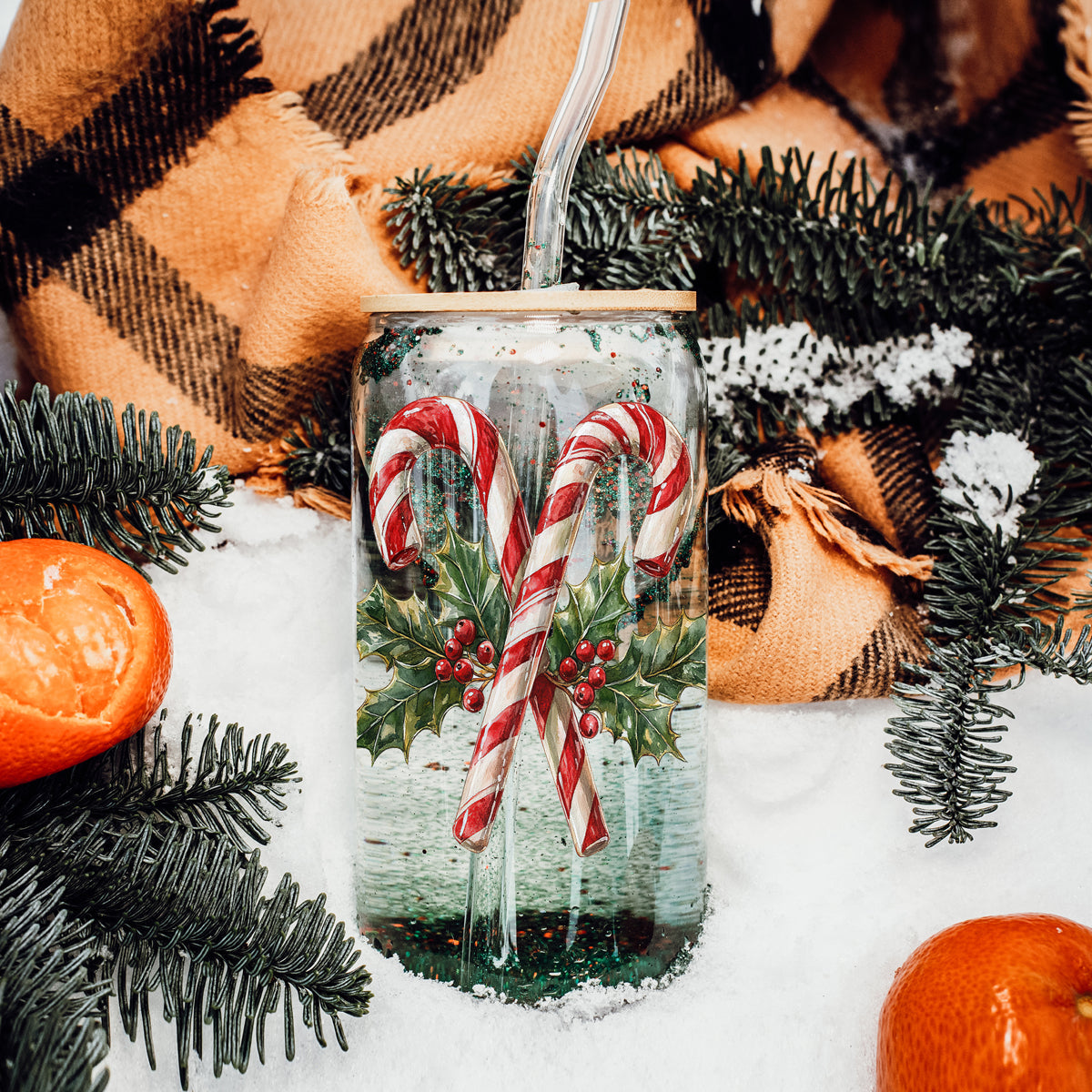 Festive Christmas tumbler - 17oz glass with candy cane and holly artwork
Christmas party drinkware - reusable glass tumbler with candy cane design